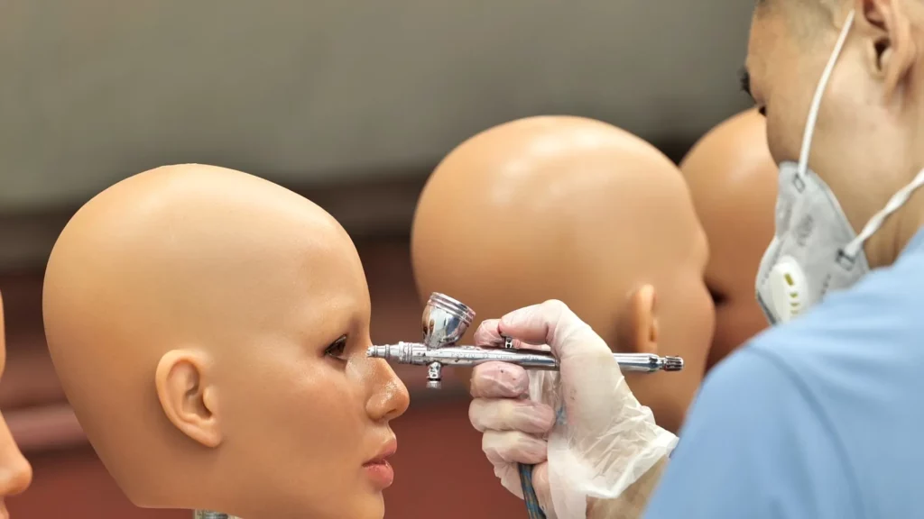 sex doll head painting